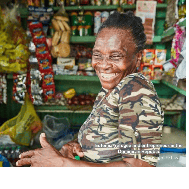 Elderly woman smiling at a local market stall
